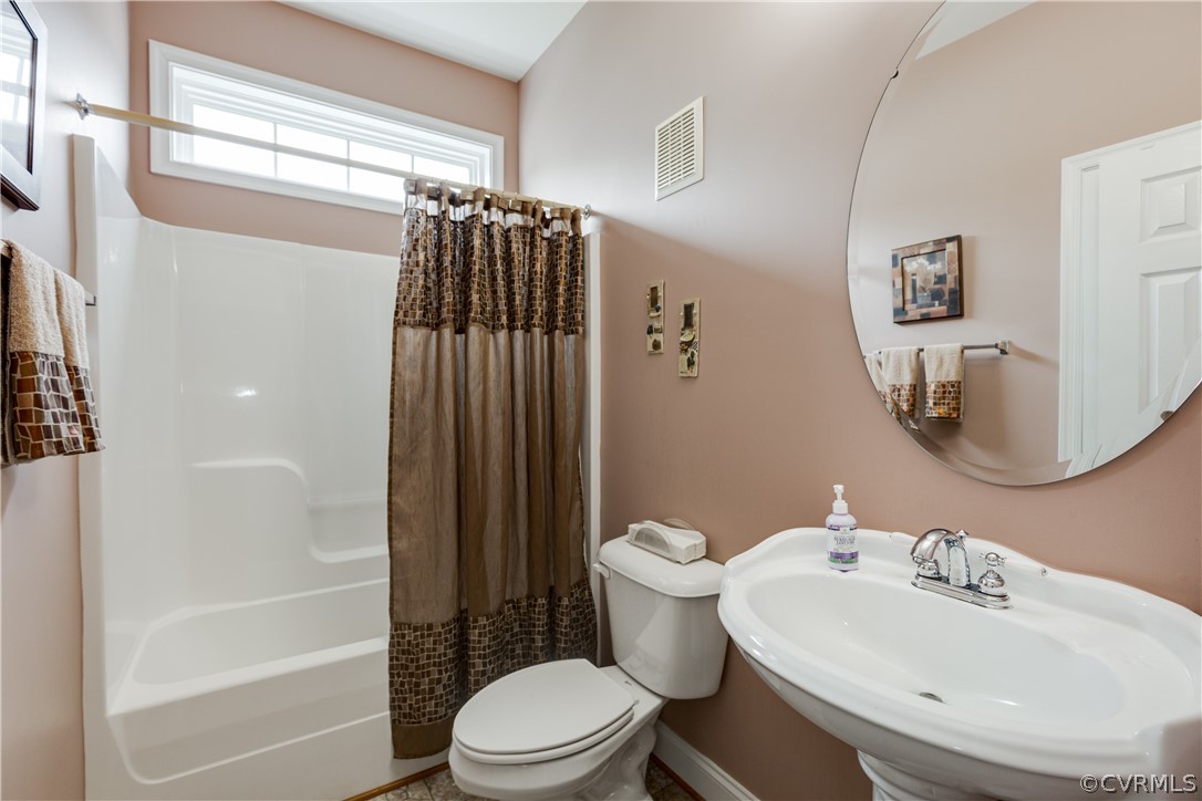 5924 Springmount Road Chesterfield, VA 23832 - Photo 13 of 49 a bathroom with a sink toilet and shower