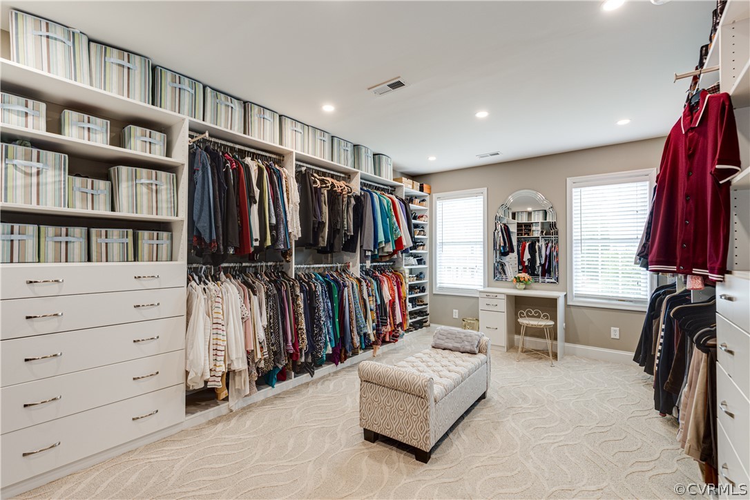 5924 Springmount Road Chesterfield, VA 23832 - Photo 30 of 49 a walk in closet with clothes and shoes