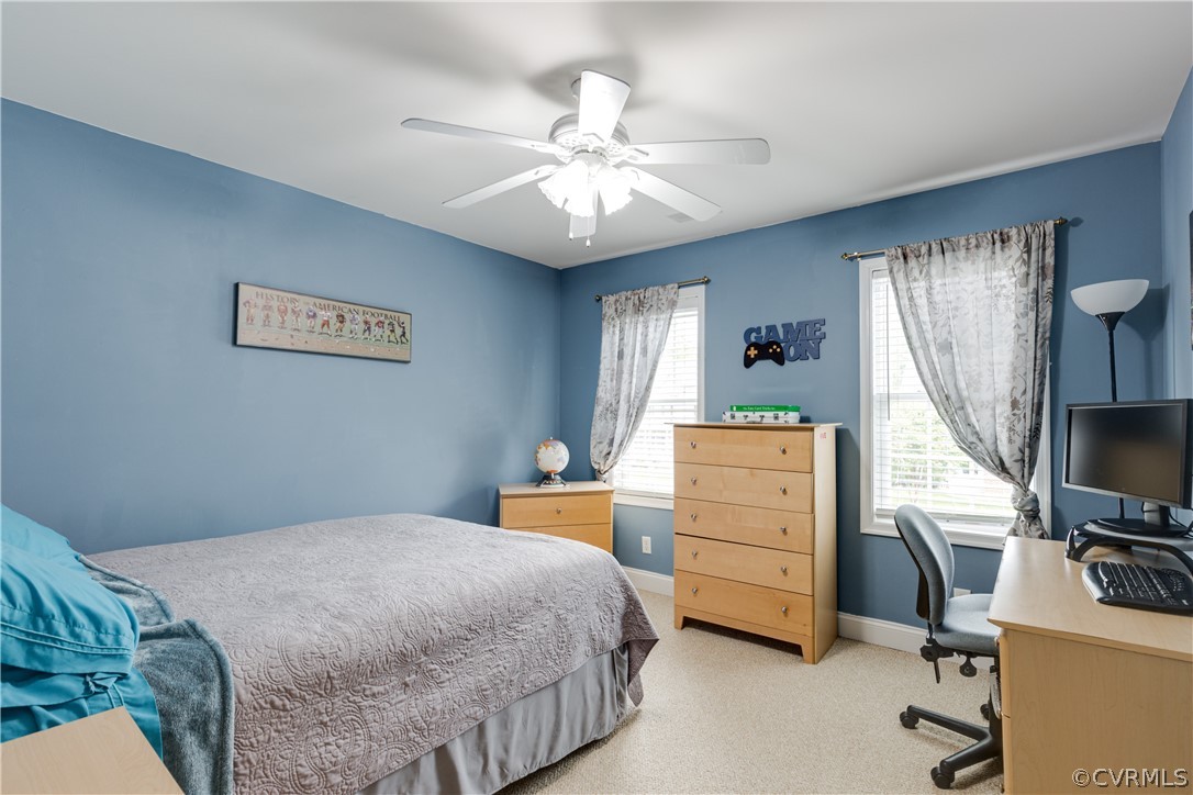 5924 Springmount Road Chesterfield, VA 23832 - Photo 35 of 49 a bedroom with a bed and a flat screen tv