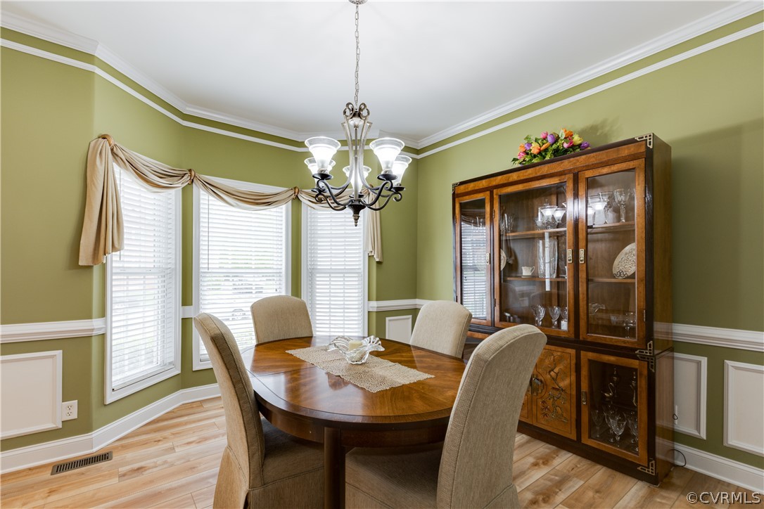 5924 Springmount Road Chesterfield, VA 23832 - Photo 6 of 49 a view of a dining room with furniture window and wooden floor