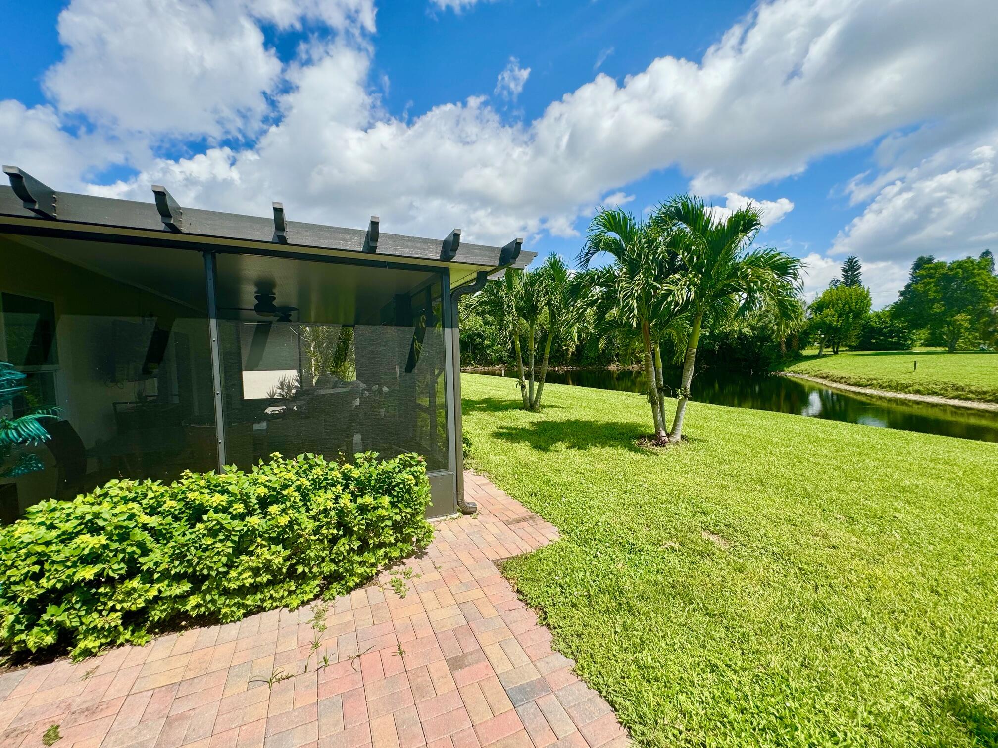15852 Laurel Oak Circle Delray Beach, FL 33484 - Photo 32 of 42 BACK POND VIEW