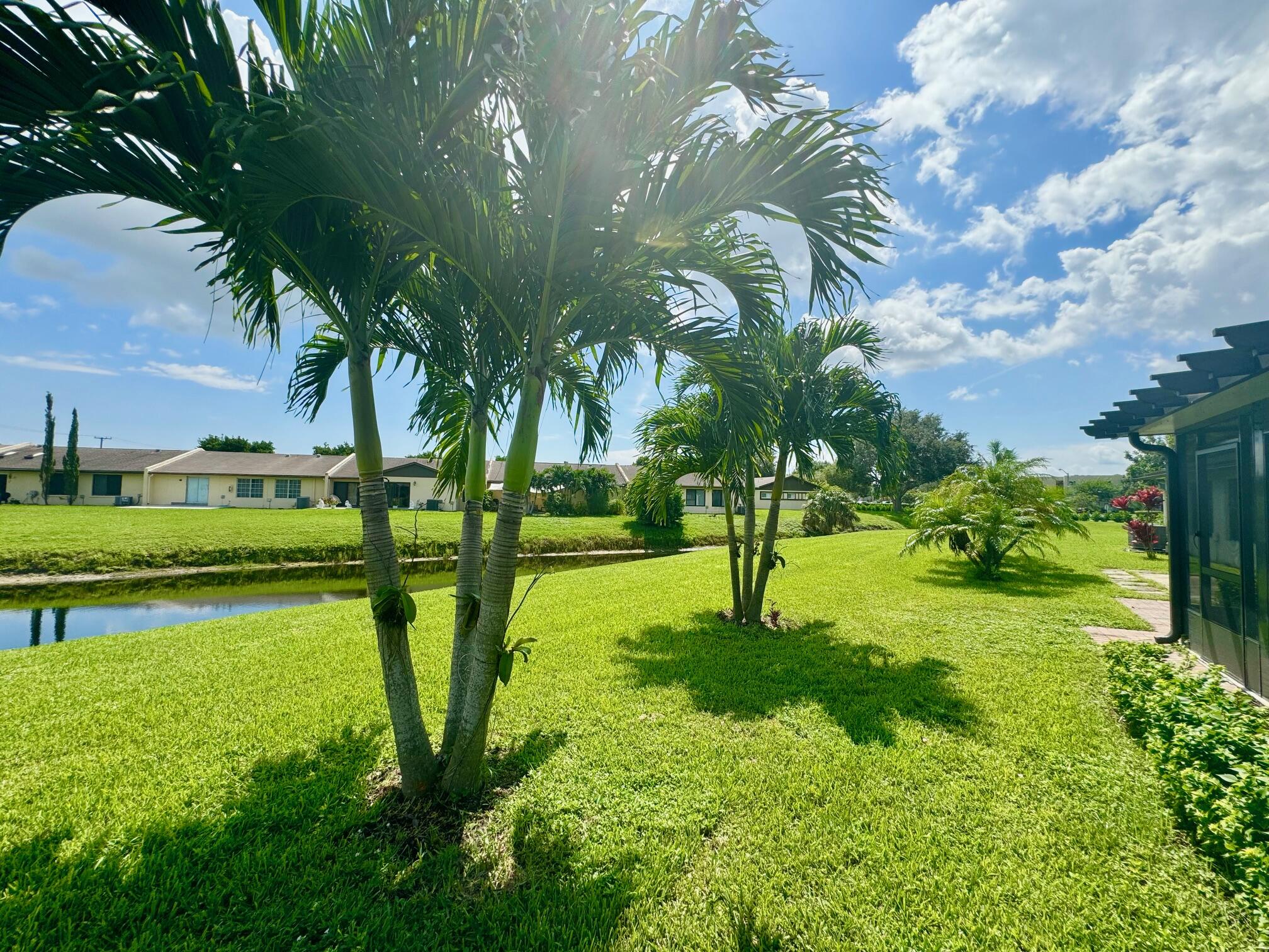 15852 Laurel Oak Circle Delray Beach, FL 33484 - Photo 33 of 42 BACK POND VIEW