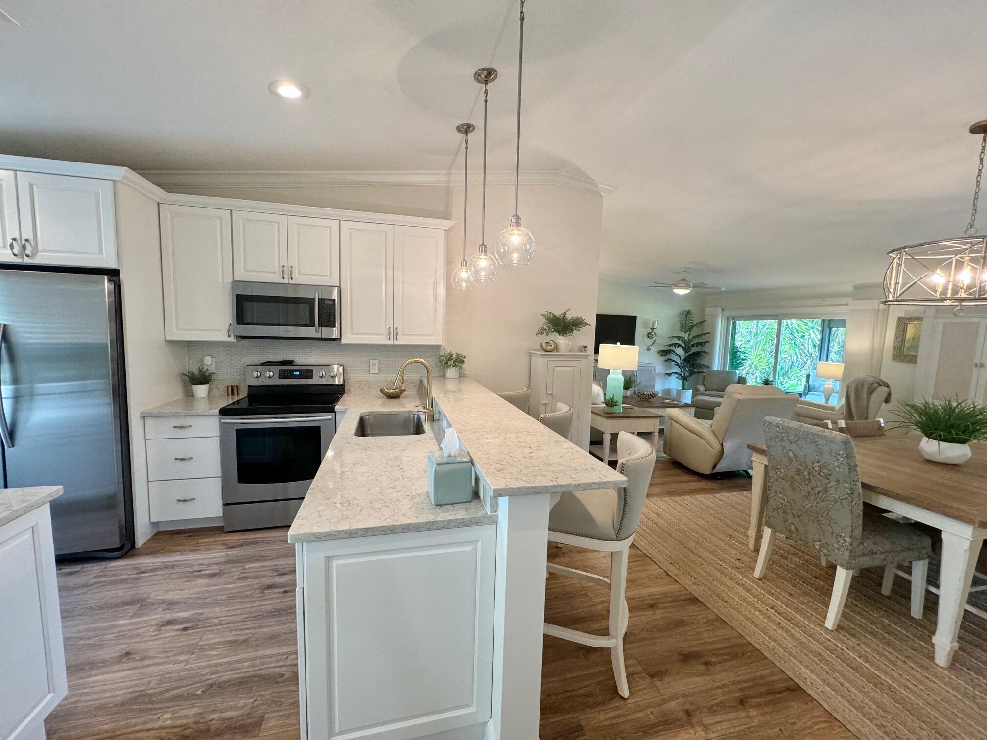 15852 Laurel Oak Circle Delray Beach, FL 33484 - Photo 4 of 42 KITCHEN GREAT ROOM