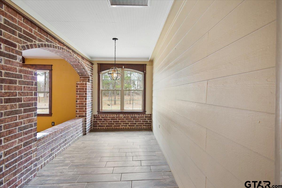 14733 County Road 384 Tyler, TX 75708 - Photo 13 of 38 a view of entryway with wooden floor