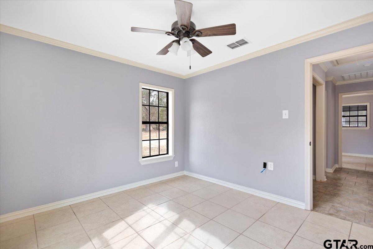 14733 County Road 384 Tyler, TX 75708 - Photo 18 of 38 a view of an empty room with a window