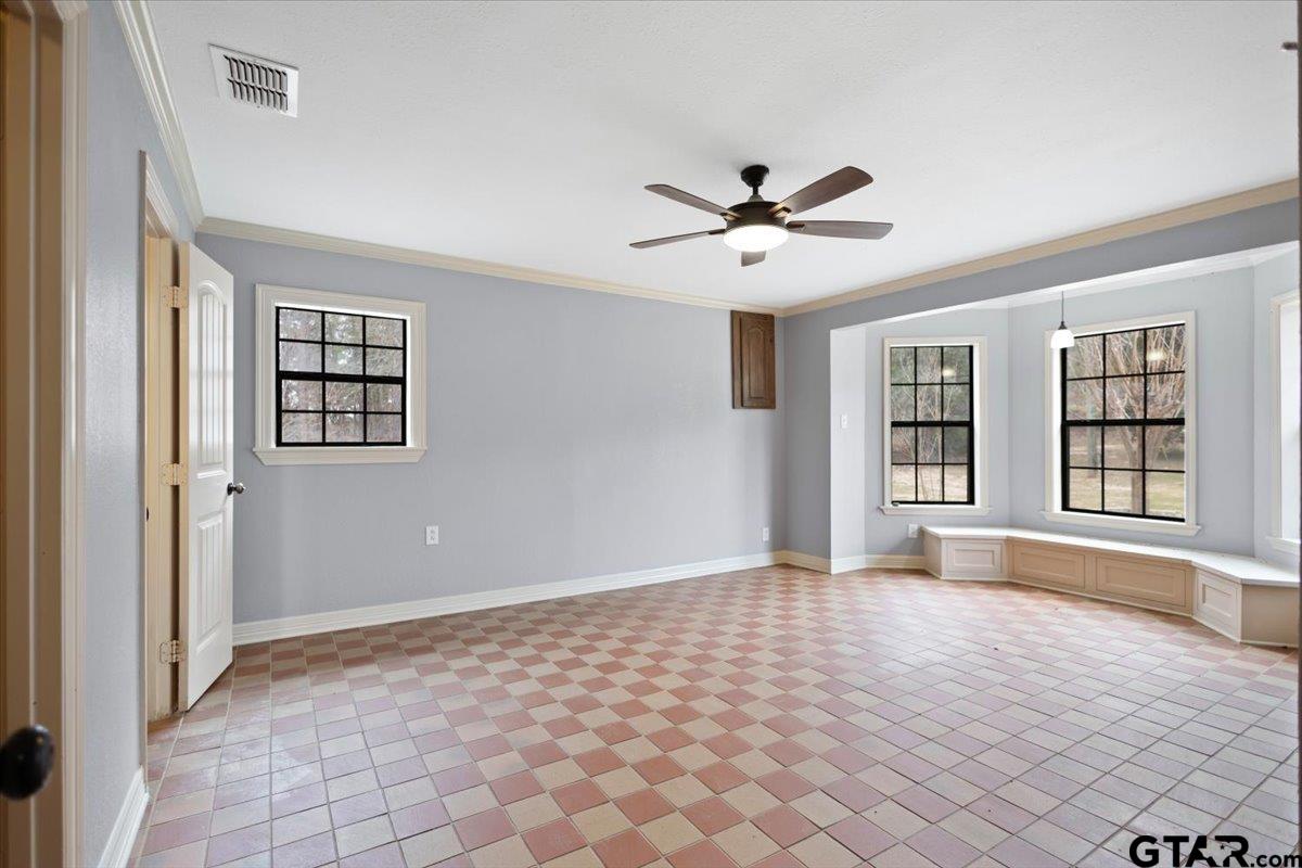 14733 County Road 384 Tyler, TX 75708 - Photo 2 of 38 a view of an empty room with a window and a kitchen