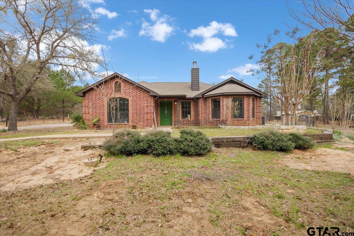 14733 County Road 384 Tyler, TX 75708 - Photo 22 of 38 a front view of a house with a yard