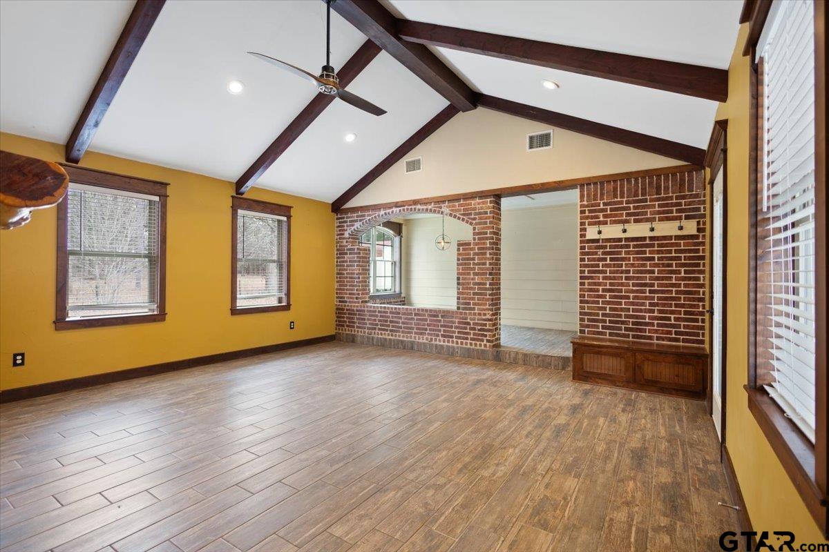 14733 County Road 384 Tyler, TX 75708 - Photo 9 of 38 a view of empty room with wooden floor and fan