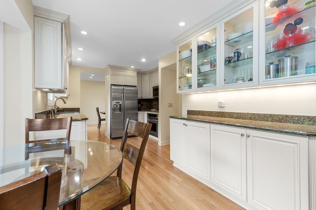 a kitchen with counter top space and appliances