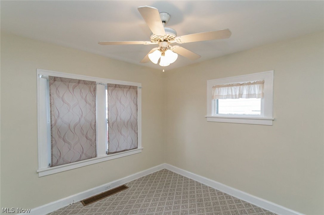 12909 Littleton Road Garfield Heights, OH 44125 - Photo 13 of 24 Bonus look at all the windows in the formal dining room!