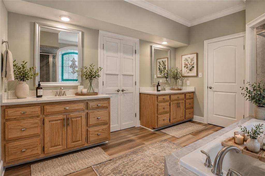 1206 Jasmine Road Dublin, GA 31021 - Photo 14 of 33 a bathroom with a sink double vanity and a mirror