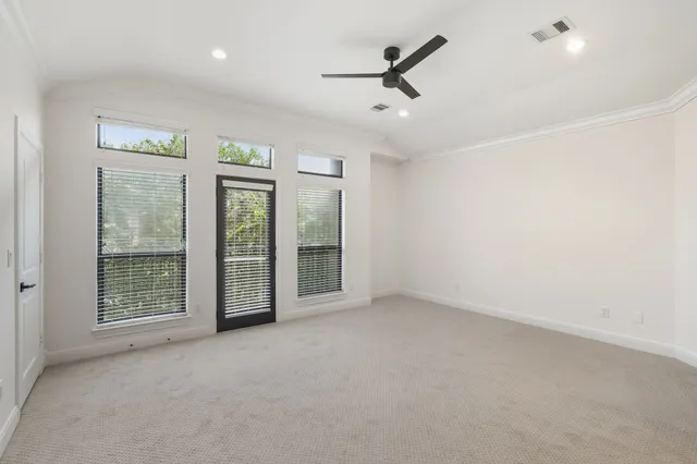 a large kitchen with stainless steel appliances double vanity and a sink