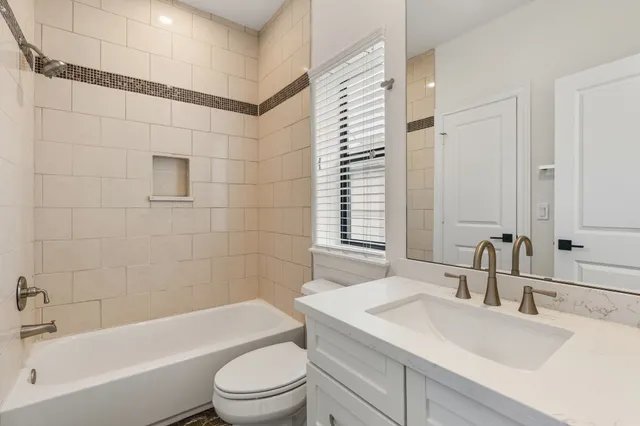 an empty room with a bathroom