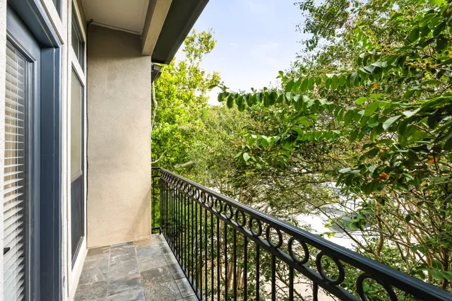 a bathroom with a sink a toilet a vanity and bathtub