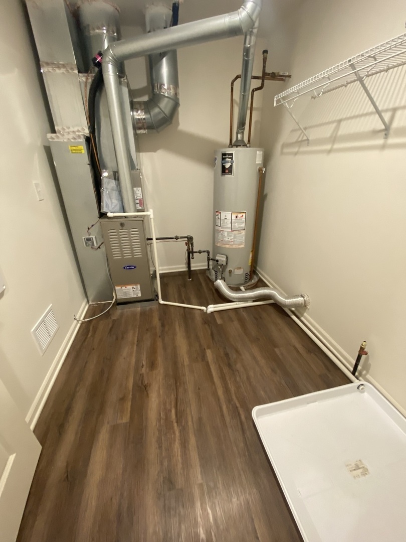 1009 North Draper Road McHenry, IL 60050 - Photo 13 of 20 a view of a room with wooden floor