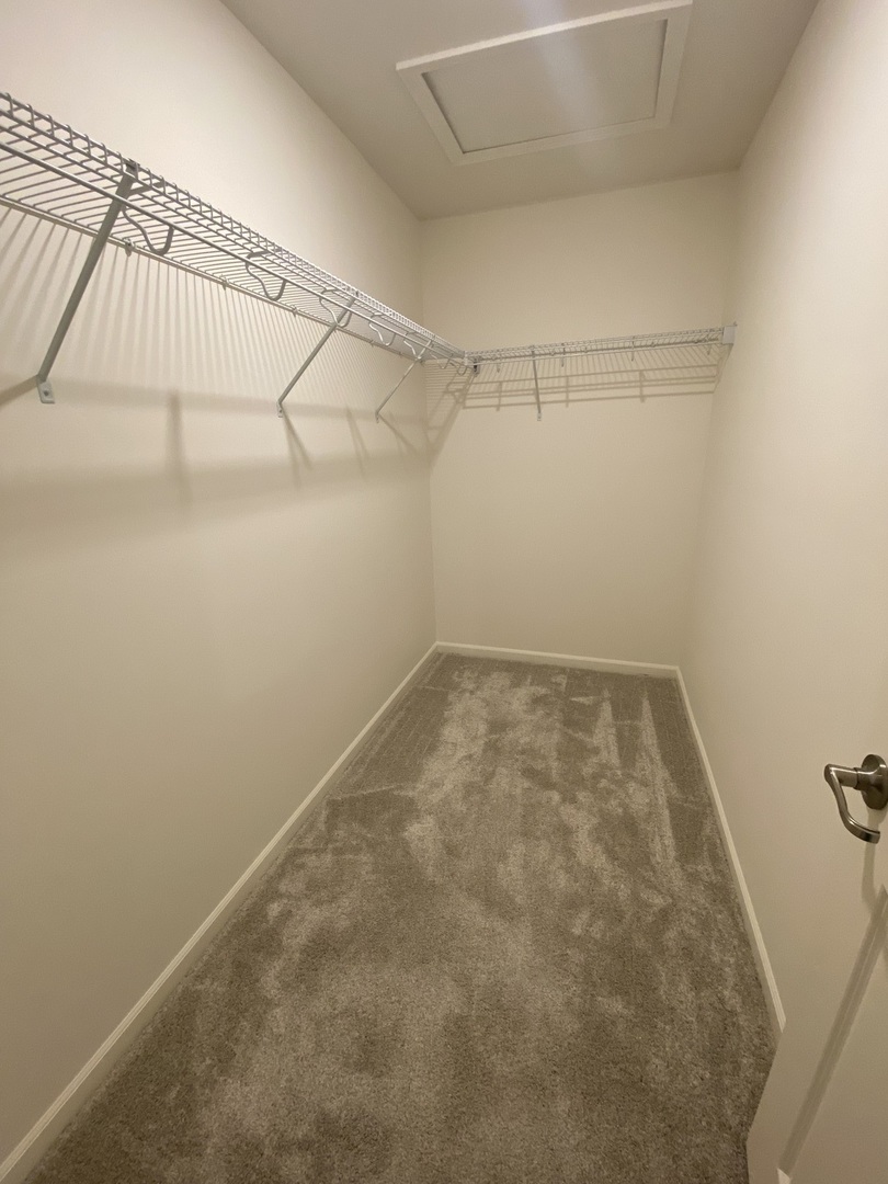 1009 North Draper Road McHenry, IL 60050 - Photo 14 of 20 a view of a room with racks on the wall