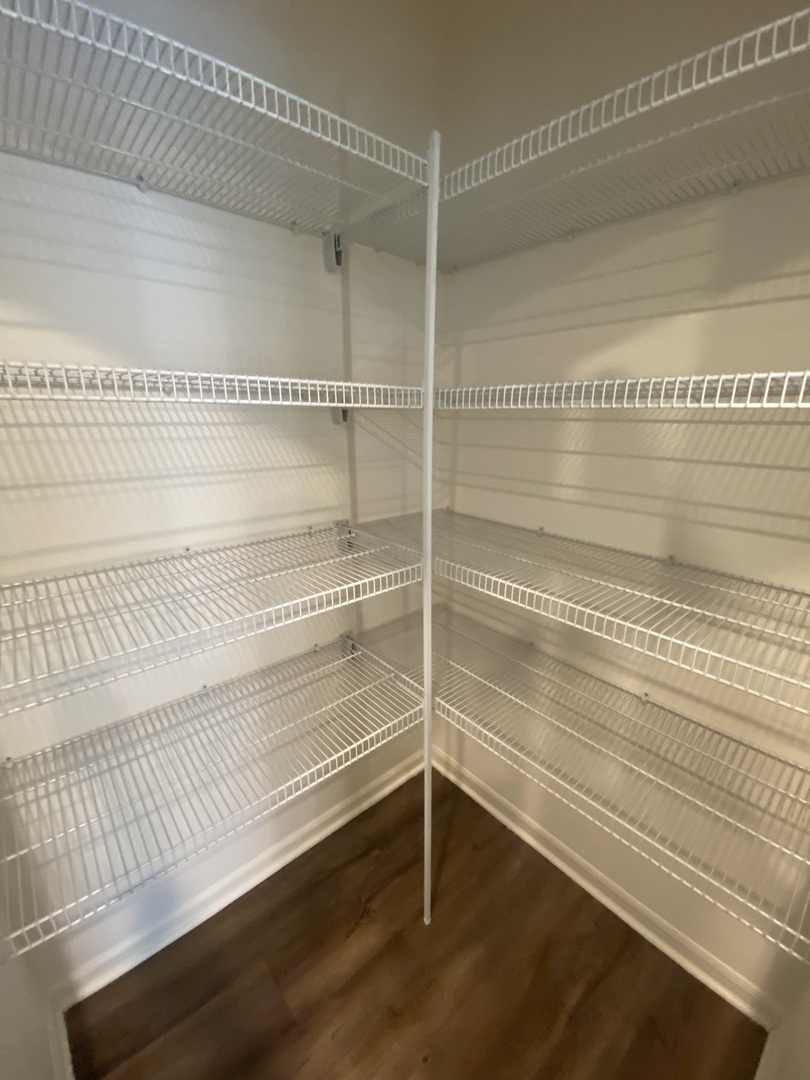 1009 North Draper Road McHenry, IL 60050 - Photo 9 of 20 a view of an empty walk in closet