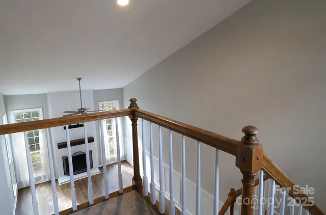 a view of an entryway with wooden floor