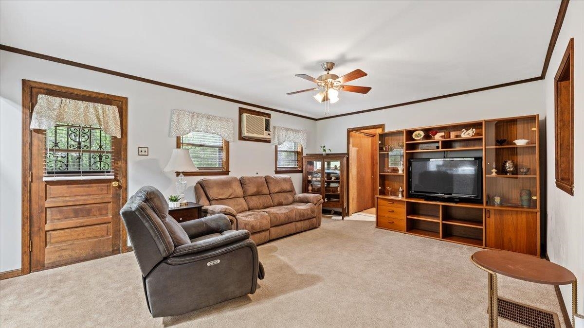 1601 Wynne Road Cordova, TN 38016 - Photo 11 of 31 a living room with furniture and a flat screen tv
