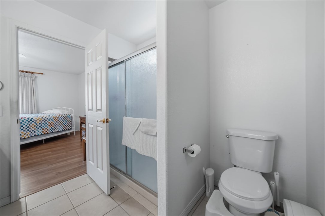 2144 Ridgeview Road Kingman, AZ 86401 - Photo 29 of 49 a bathroom with a toilet and a shower