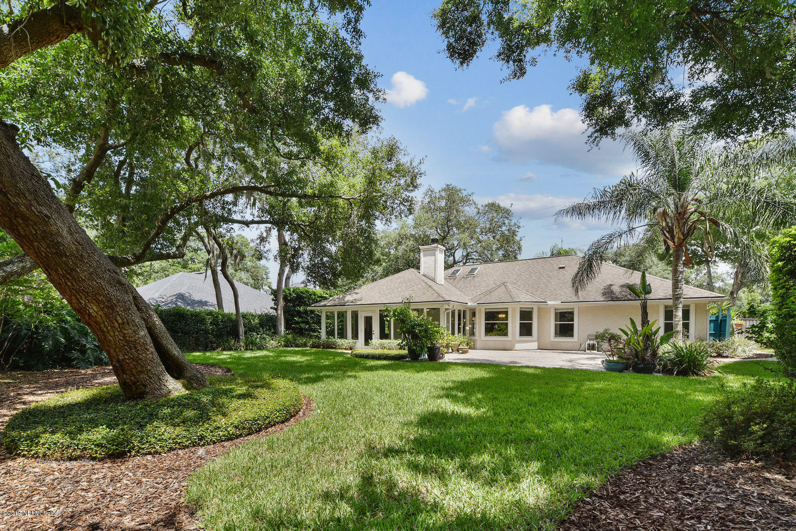 1136 Kings Road Neptune Beach, FL 32266 - Photo 27 of 31 yard & rear facade