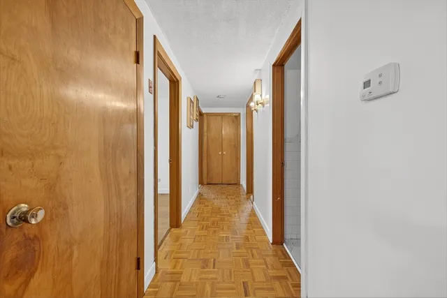a view of a bathroom from the hallway