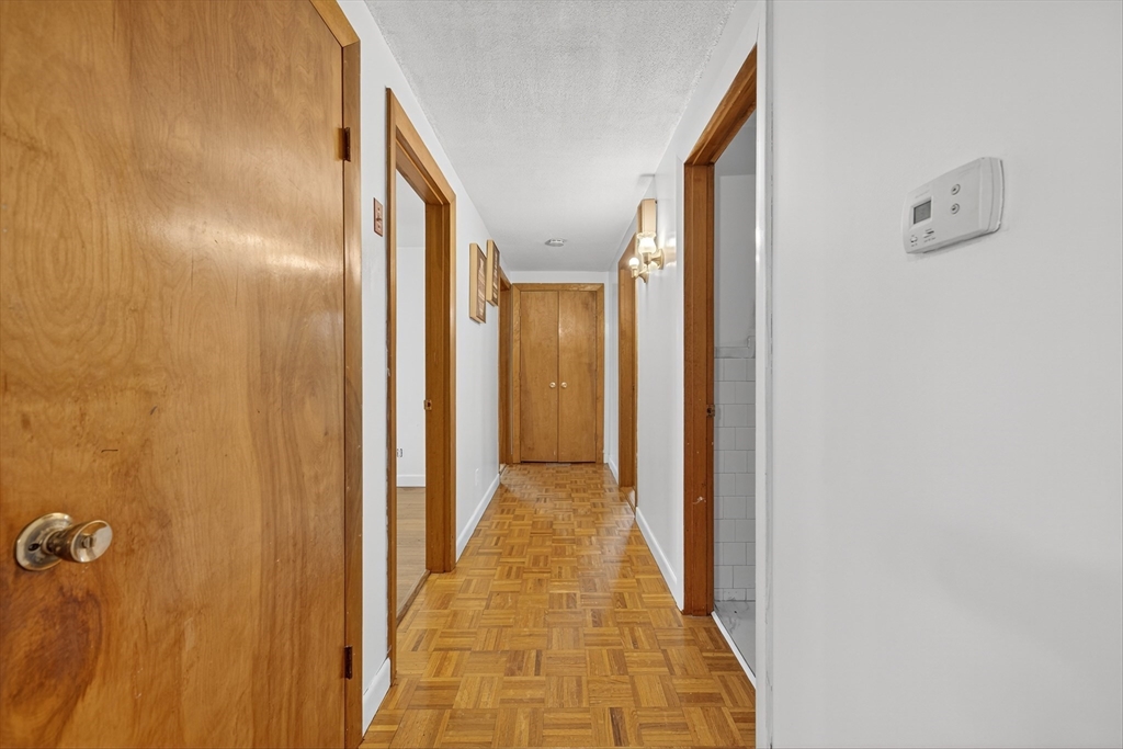 33 Isleboro Street Worcester, MA 01606 - Photo 12 of 36 a view of a bathroom from the hallway