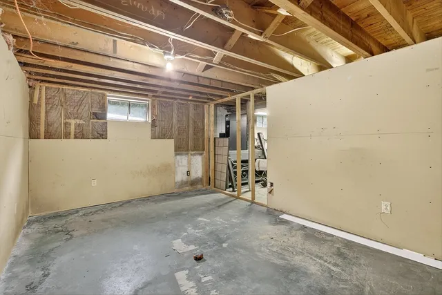 a view of a room with wooden walls