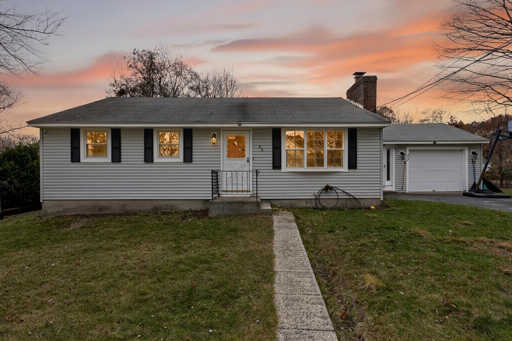 33 Isleboro Street Worcester, MA 01606 - Photo 33 of 36 a front view of a house with garden