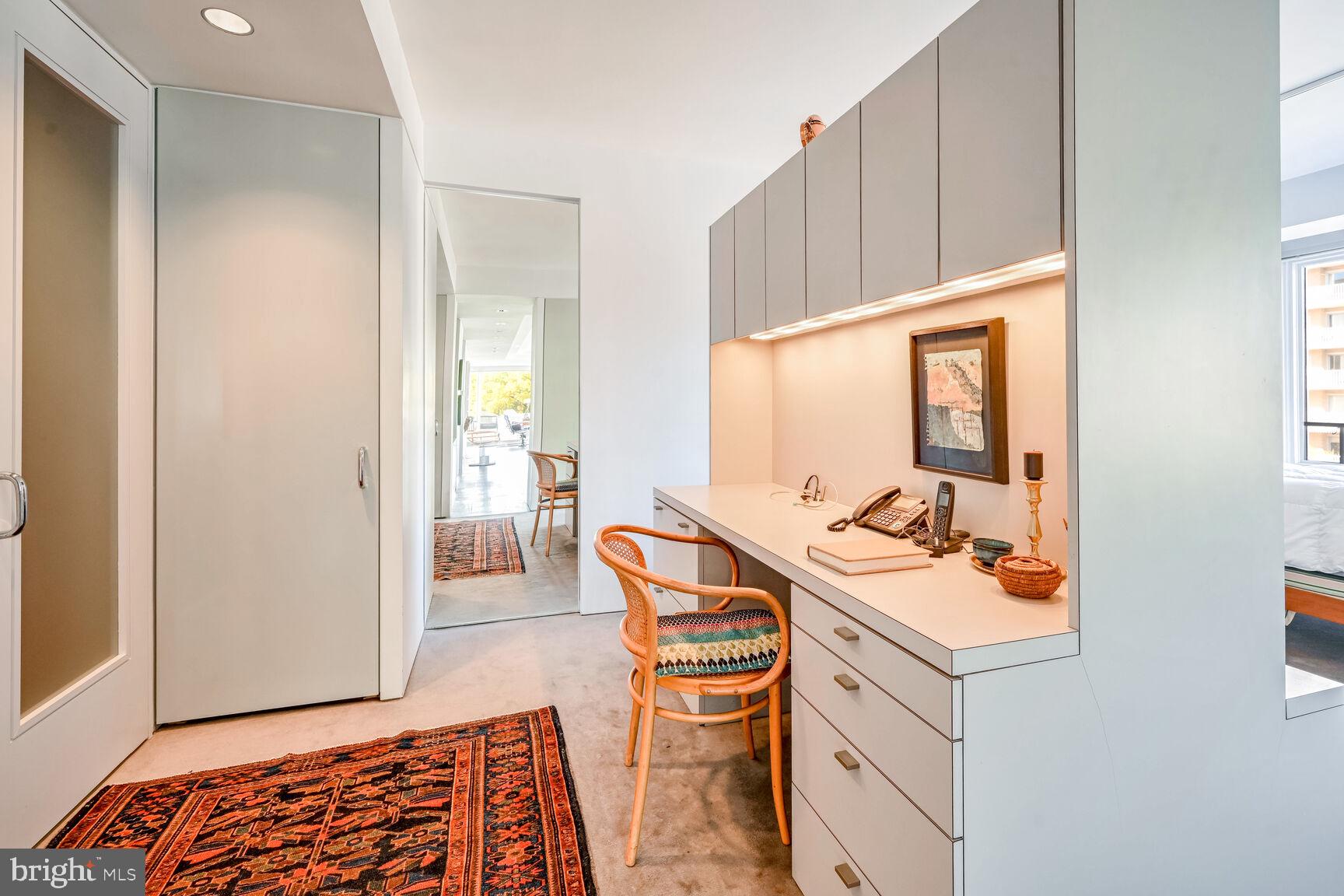 2475 Virginia Avenue Northwest, Unit 621 Washington, DC 20037 - Photo 25 of 49 a room with sink and mirror
