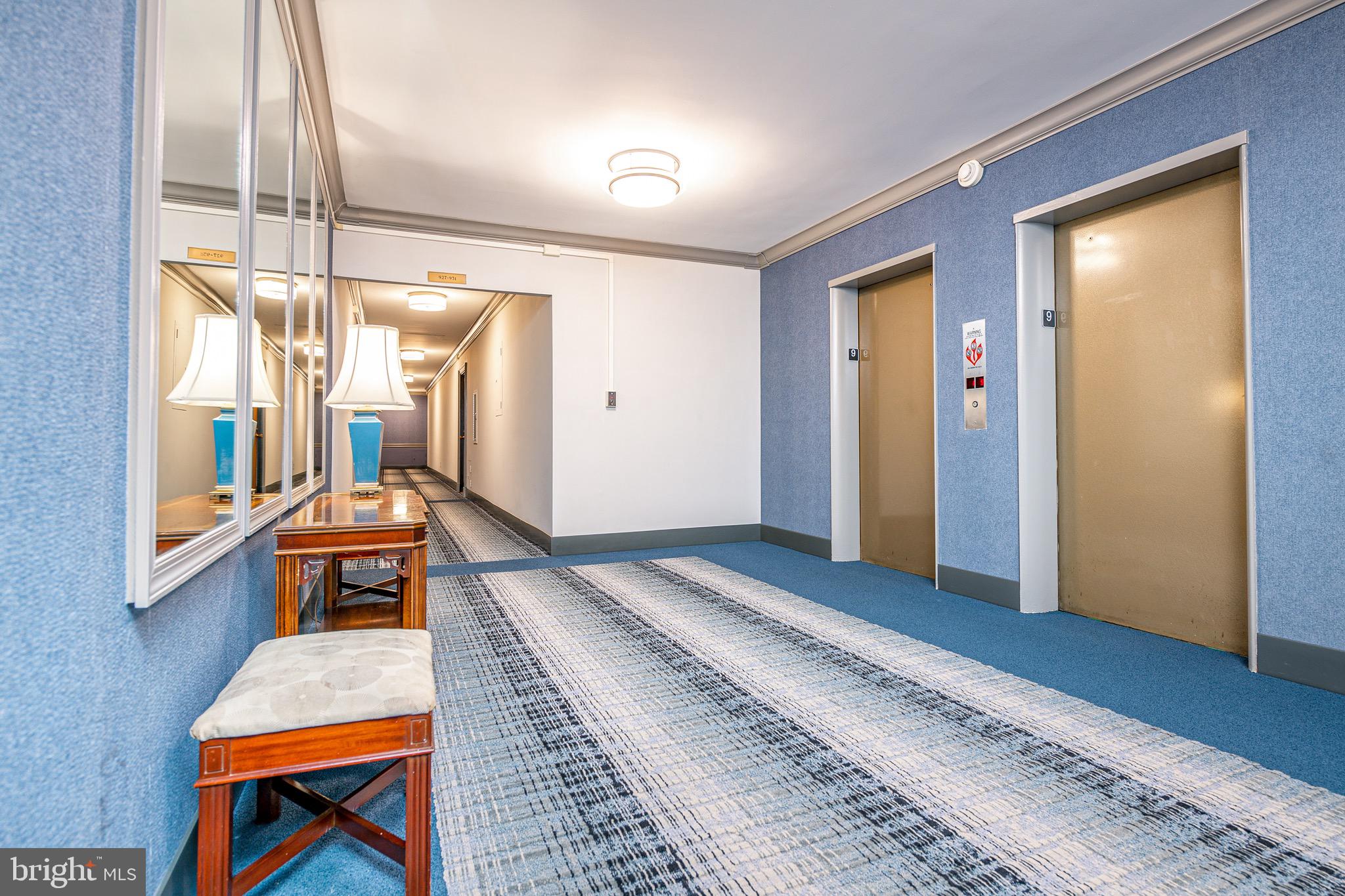 2475 Virginia Avenue Northwest, Unit 621 Washington, DC 20037 - Photo 36 of 49 a bedroom with a bed and a window