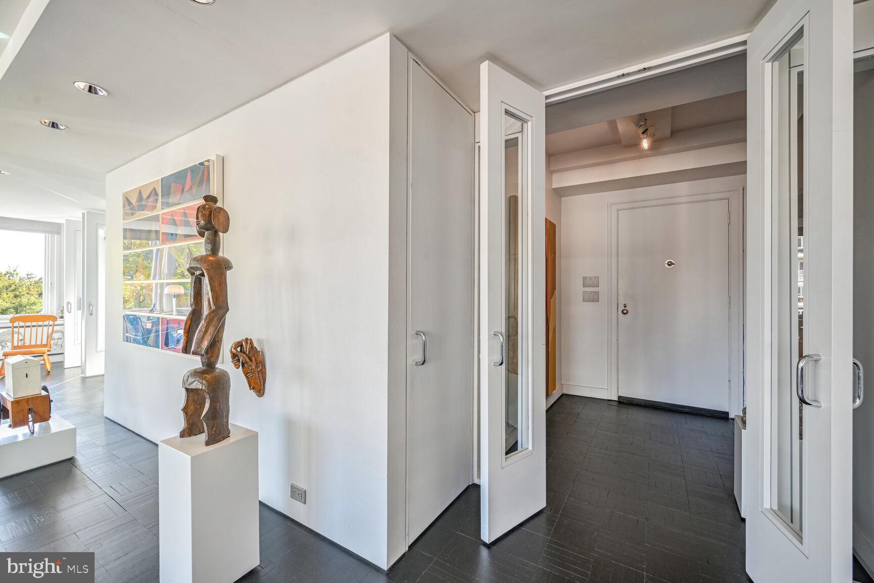 2475 Virginia Avenue Northwest, Unit 621 Washington, DC 20037 - Photo 6 of 49 a view of hallway with wooden floor