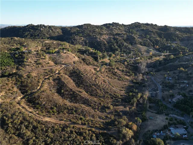 an aerial view of residential house and green space