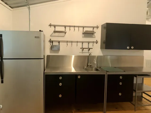 a bathroom with a sink and mirror