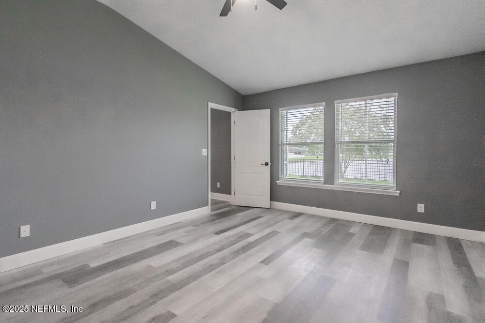 1751 Hollow Glen Drive Middleburg, FL 32068 - Photo 11 of 23 a view of an empty room with a window