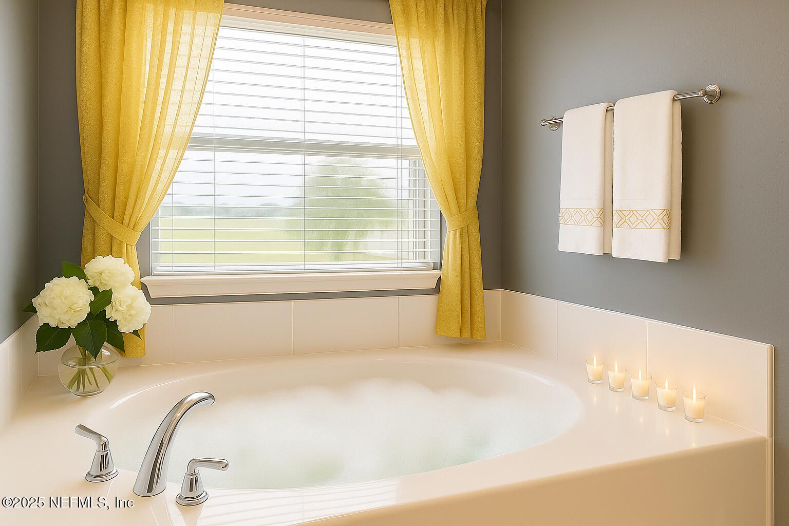 1751 Hollow Glen Drive Middleburg, FL 32068 - Photo 16 of 23 a bath tub sitting in a bathroom next to a window