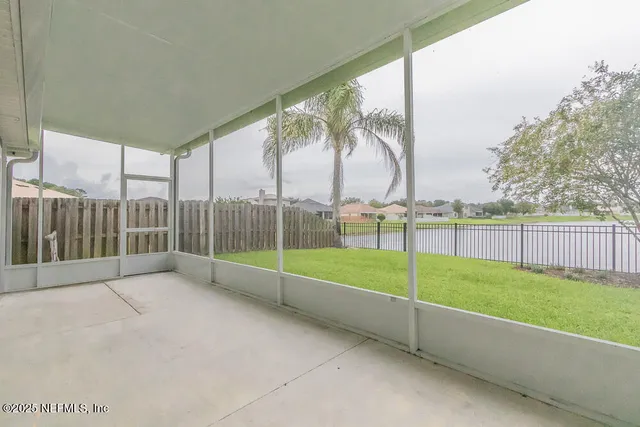 a view of an outdoor sitting area with furniture