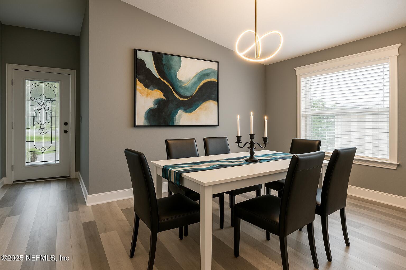 1751 Hollow Glen Drive Middleburg, FL 32068 - Photo 4 of 23 a view of a dining room with furniture window and wooden floor