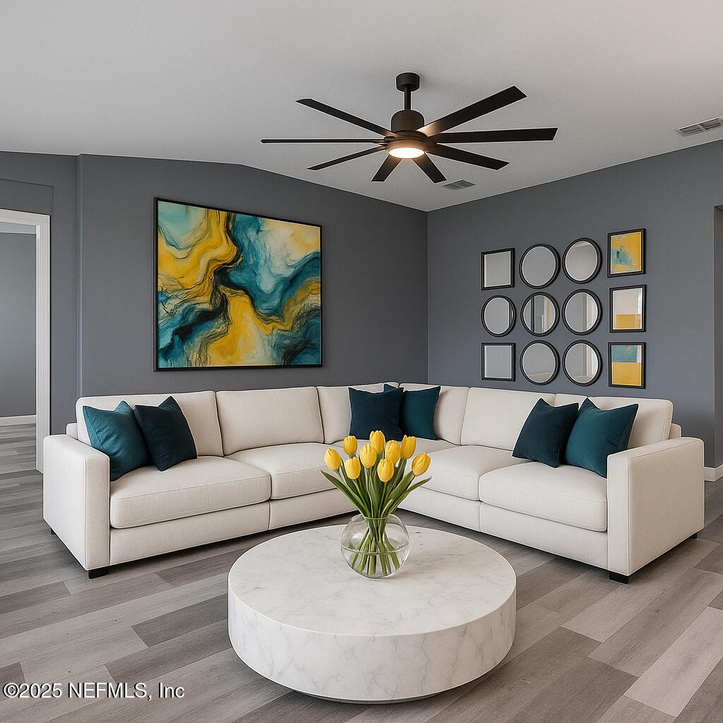 1751 Hollow Glen Drive Middleburg, FL 32068 - Photo 10 of 23 a living room with furniture and a white walls