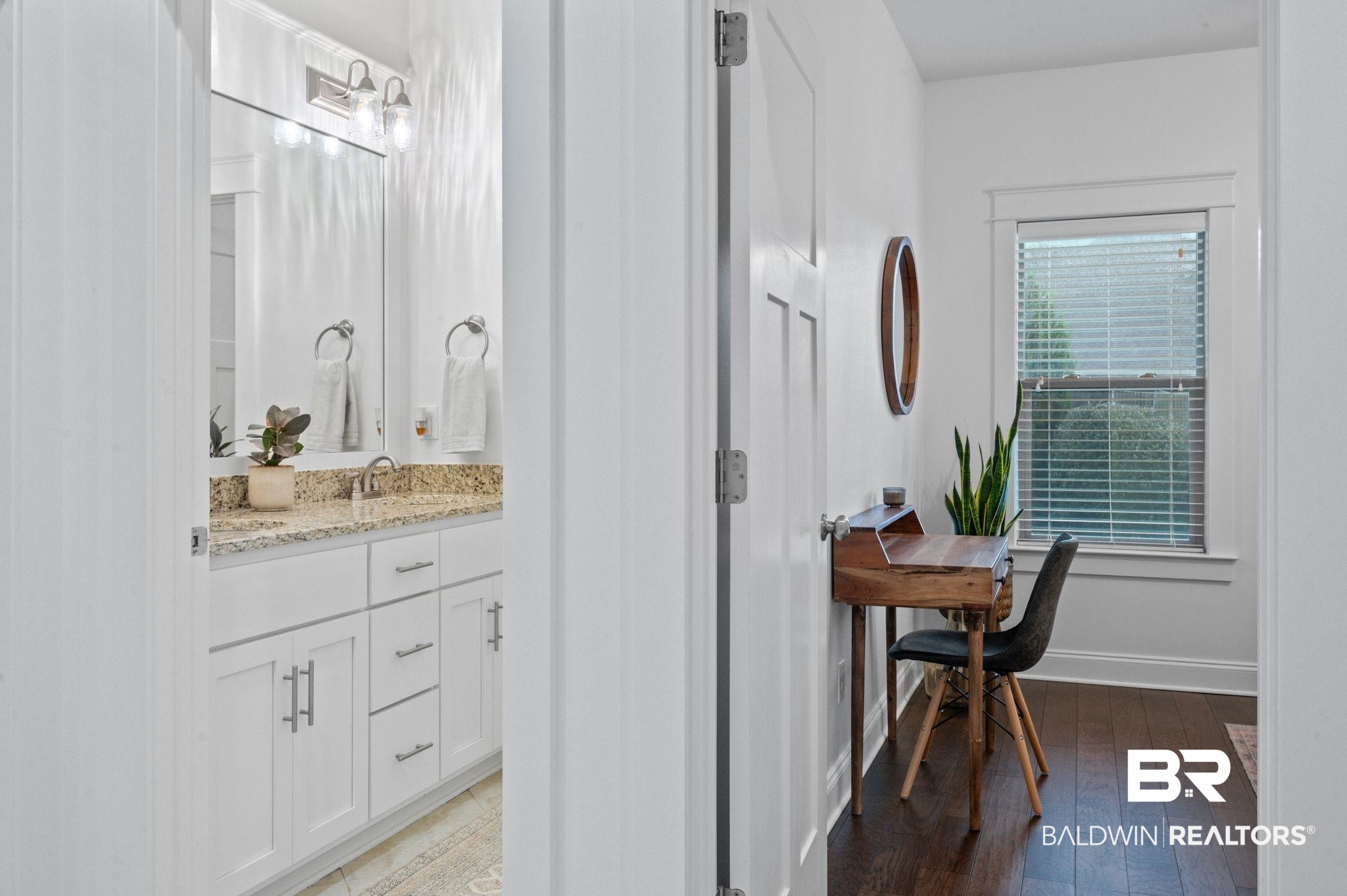 418 Fortune Drive Fairhope, AL 36532 - Photo 38 of 63 Bathroom featuring hardwood / wood-style floors and vanity