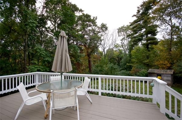 11 Tricorne Road Lexington, MA 02421 - Photo 15 of 15 a view of a chair and table on the deck