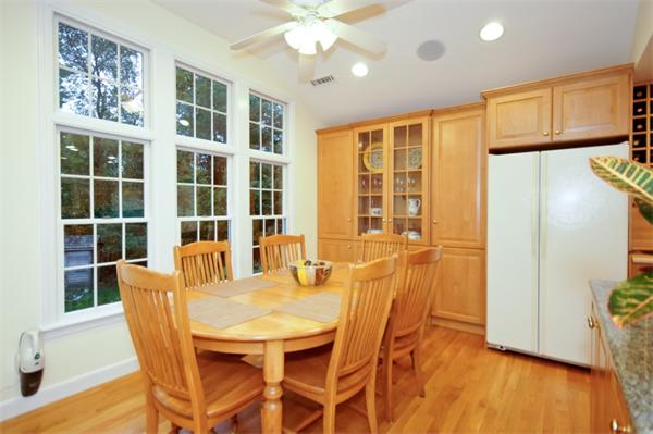 11 Tricorne Road Lexington, MA 02421 - Photo 4 of 15 a view of a dining room with furniture window and wooden floor