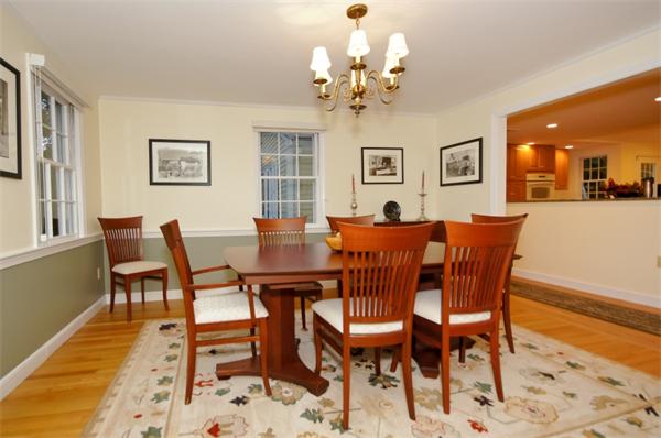 11 Tricorne Road Lexington, MA 02421 - Photo 6 of 15 a view of a dining room with furniture and wooden floor