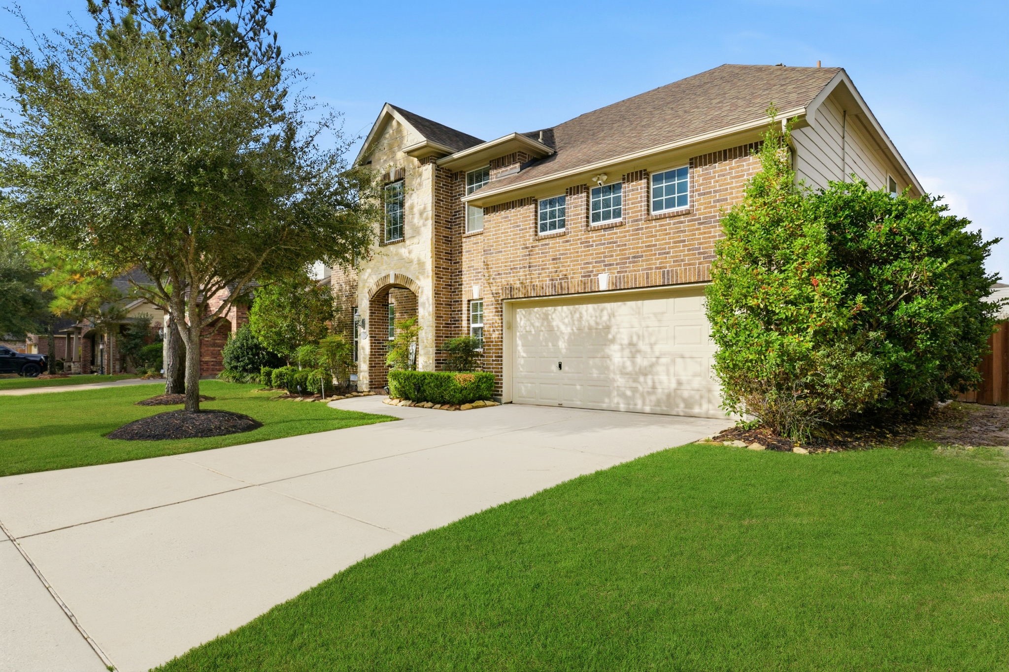 29019 Comal Karst Drive Spring, TX 77386 - Photo 2 of 50 a front view of a house with a yard and garage