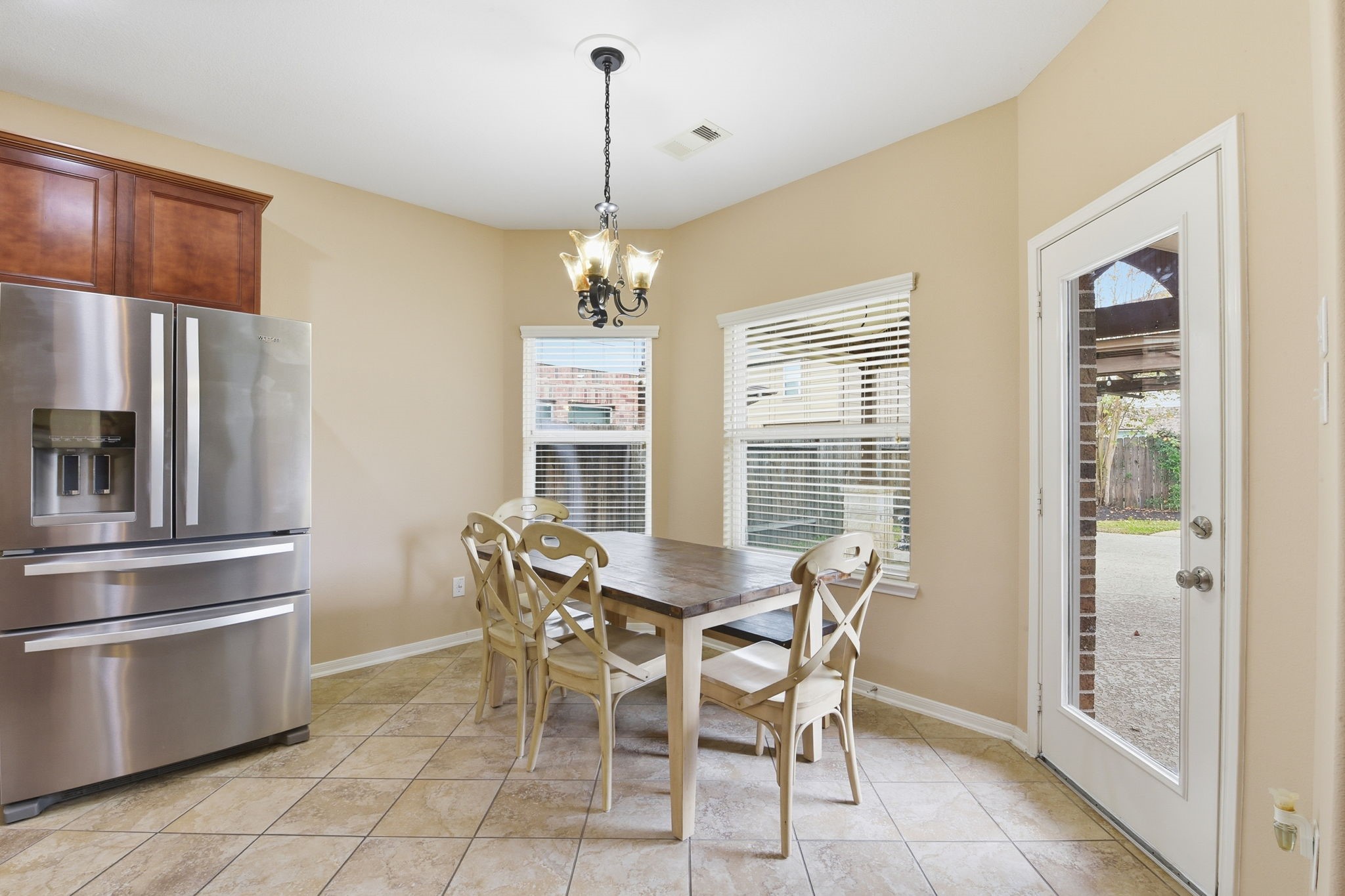 29019 Comal Karst Drive Spring, TX 77386 - Photo 21 of 50 a view of a dining room with furniture window and outside view