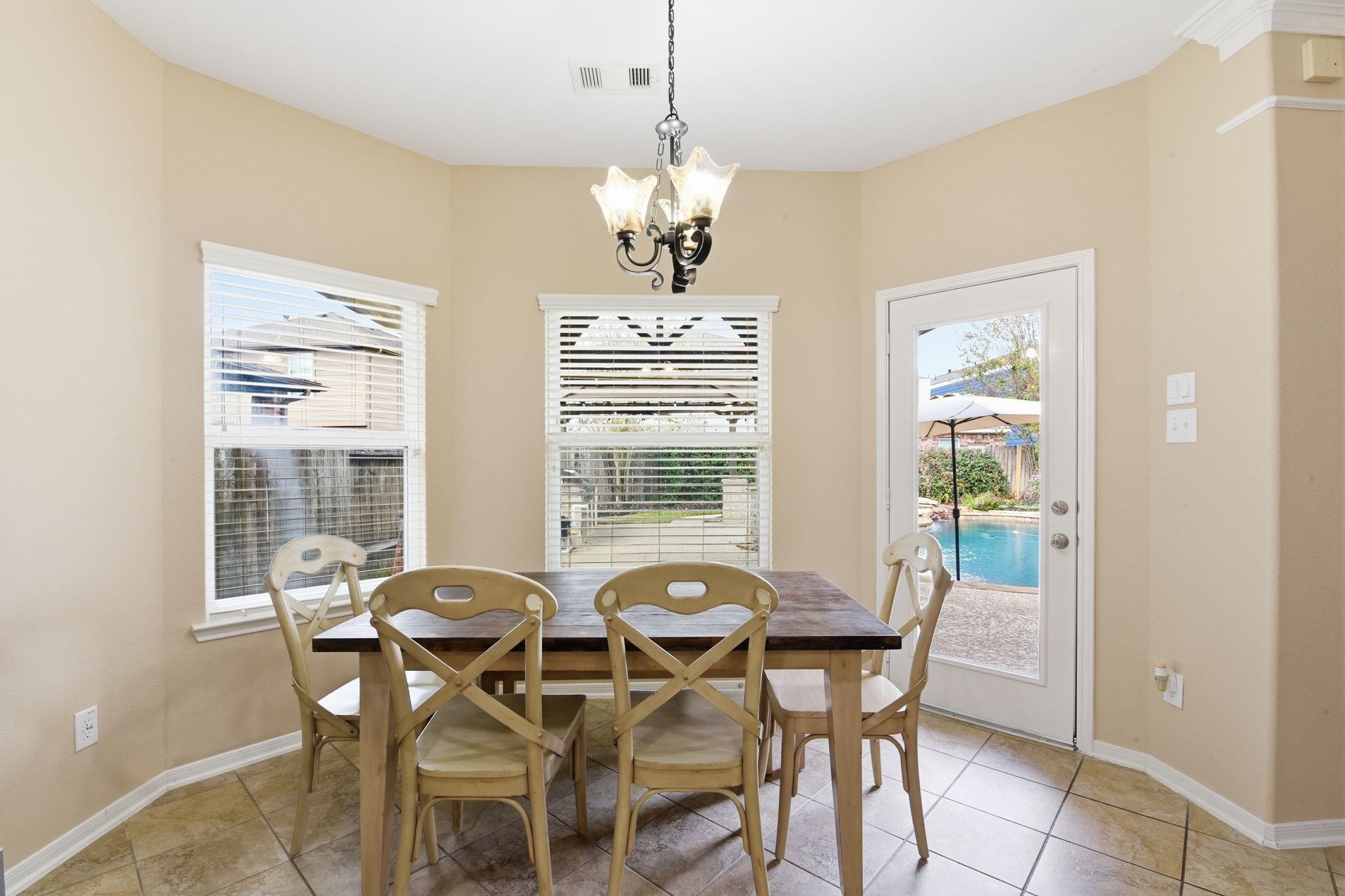29019 Comal Karst Drive Spring, TX 77386 - Photo 22 of 50 a view of a dining room with furniture and windows