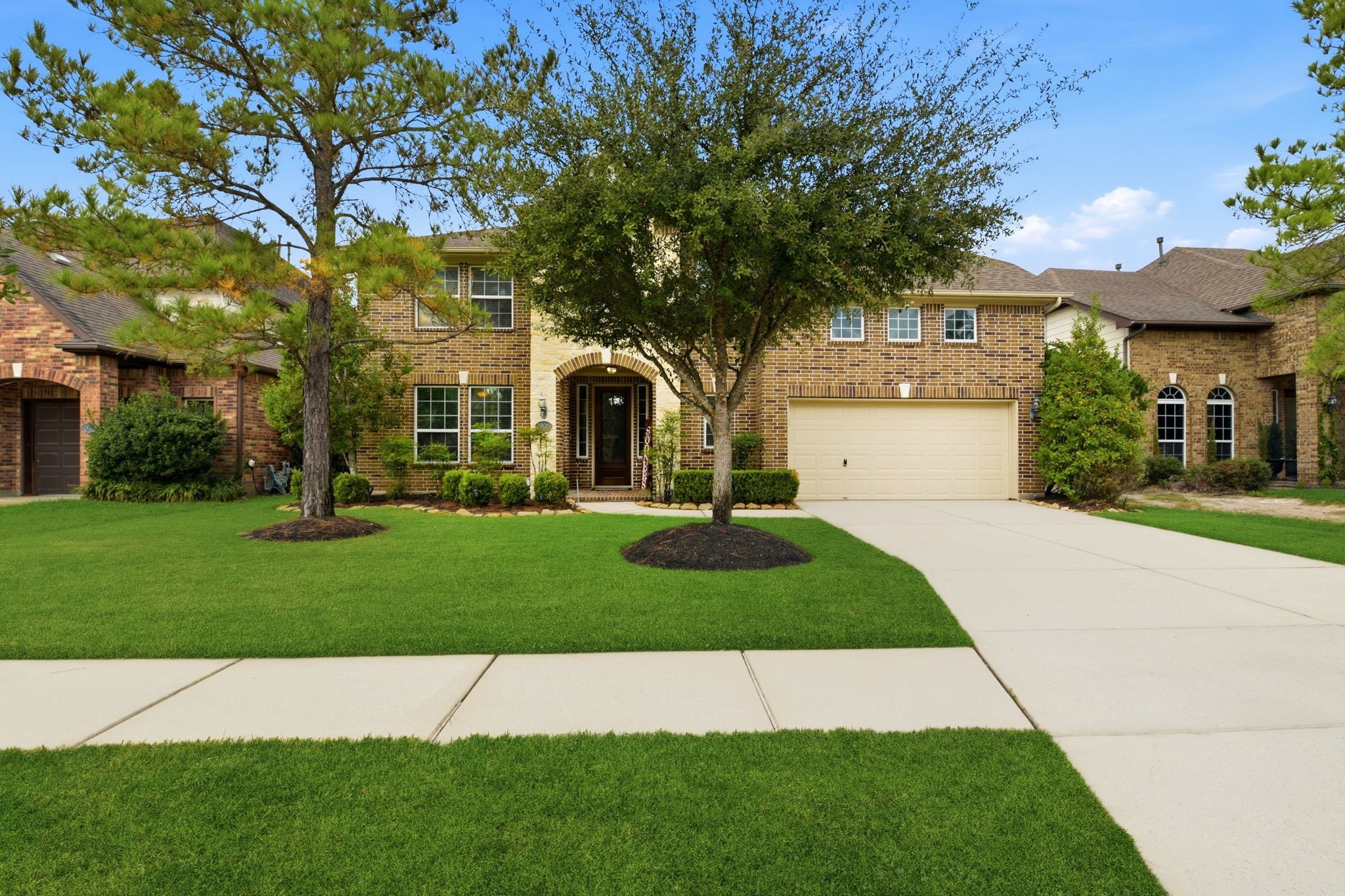 29019 Comal Karst Drive Spring, TX 77386 - Photo 3 of 50 a view of a yard with plants and large trees