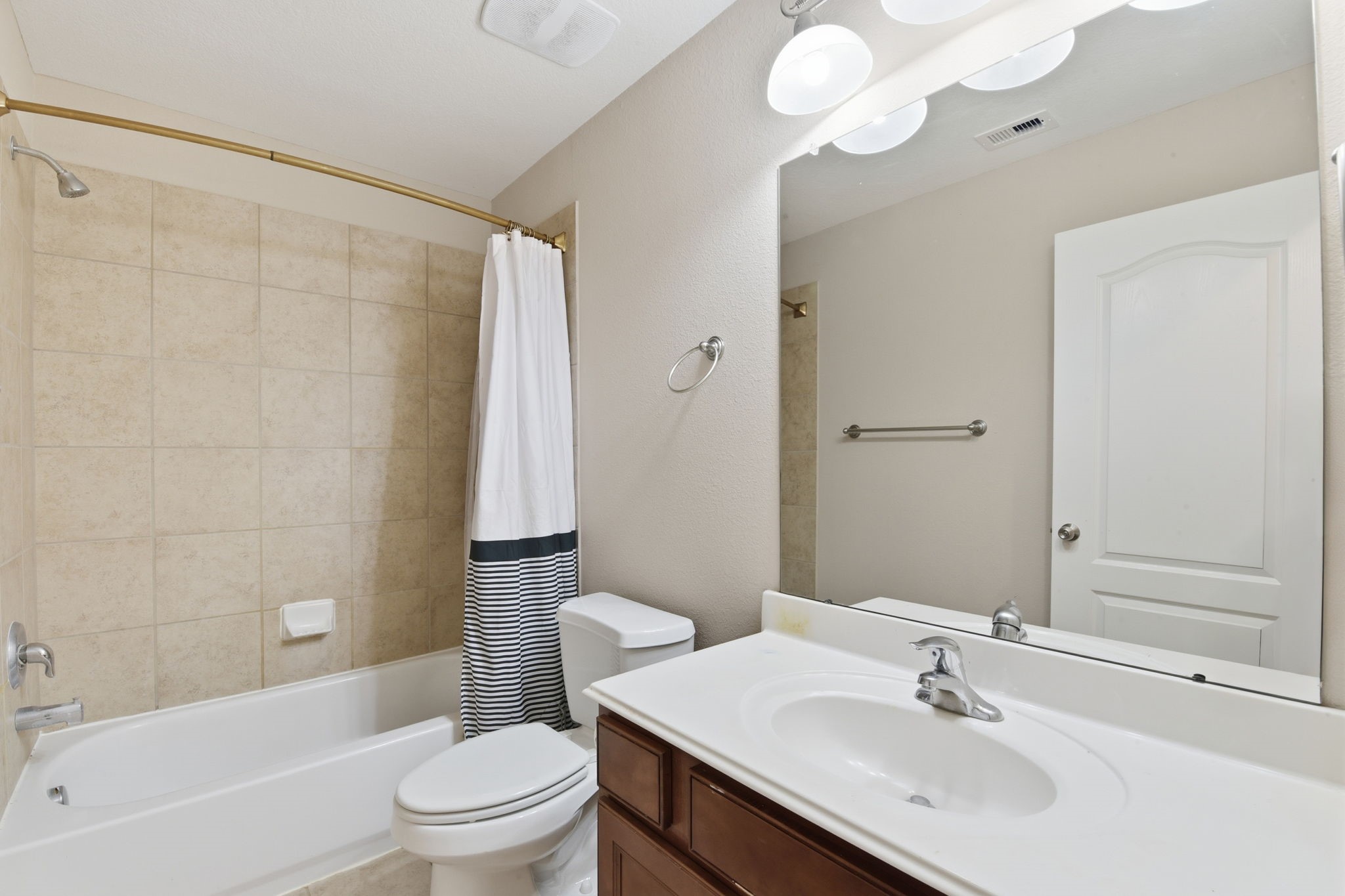 29019 Comal Karst Drive Spring, TX 77386 - Photo 35 of 50 a bathroom with a sink a toilet and shower