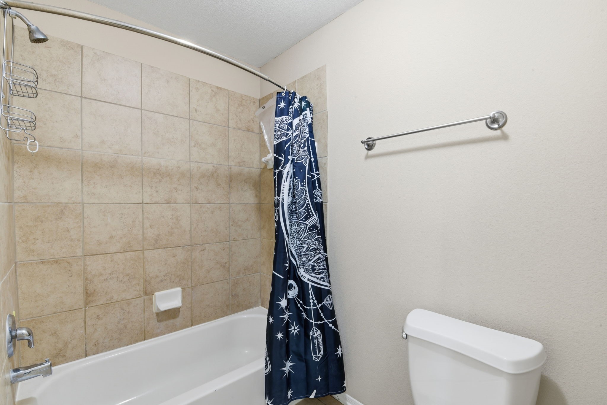 29019 Comal Karst Drive Spring, TX 77386 - Photo 41 of 50 a bathroom with a shower a toilet and sink