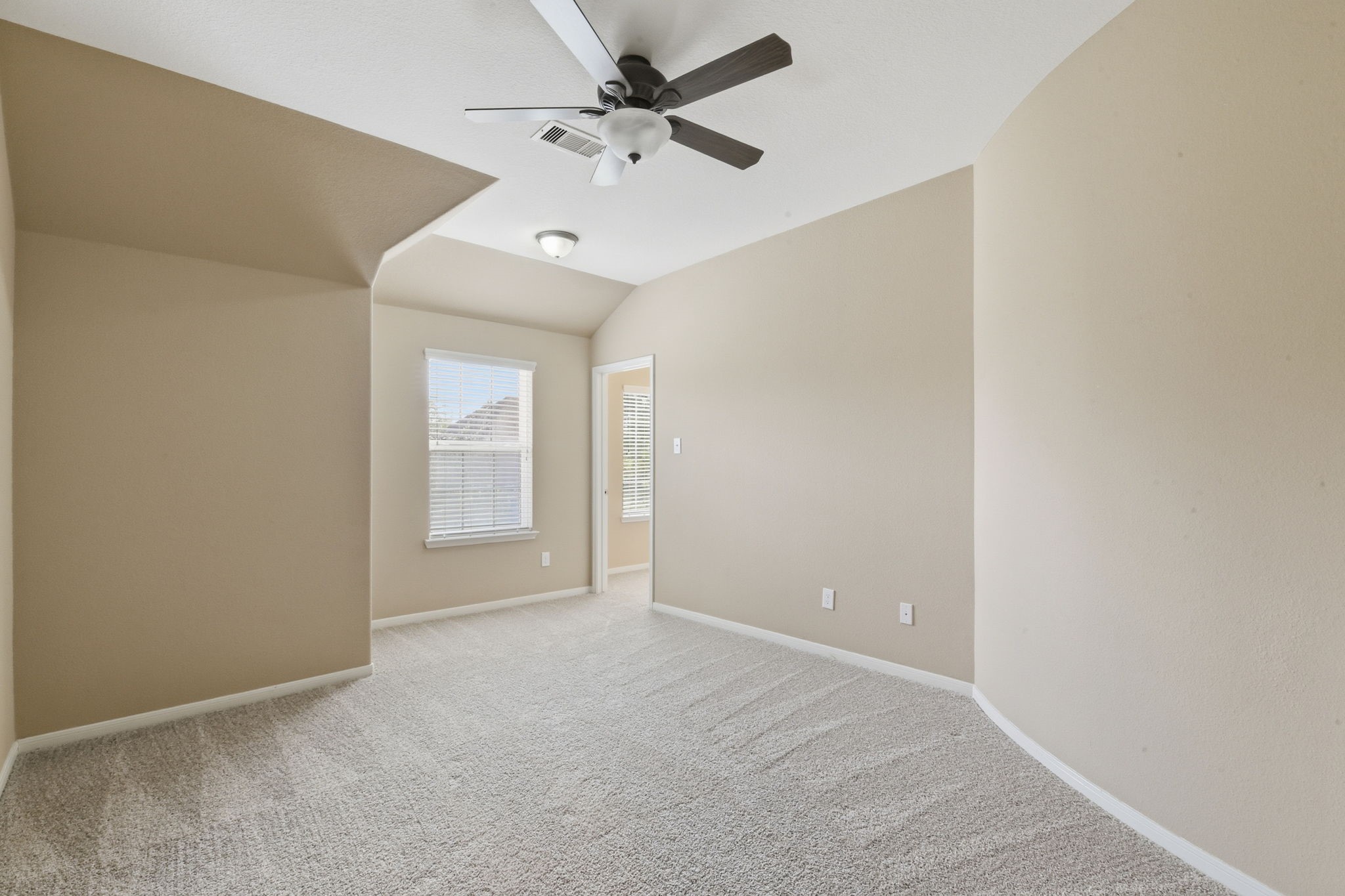 29019 Comal Karst Drive Spring, TX 77386 - Photo 43 of 50 an empty room with windows and fan